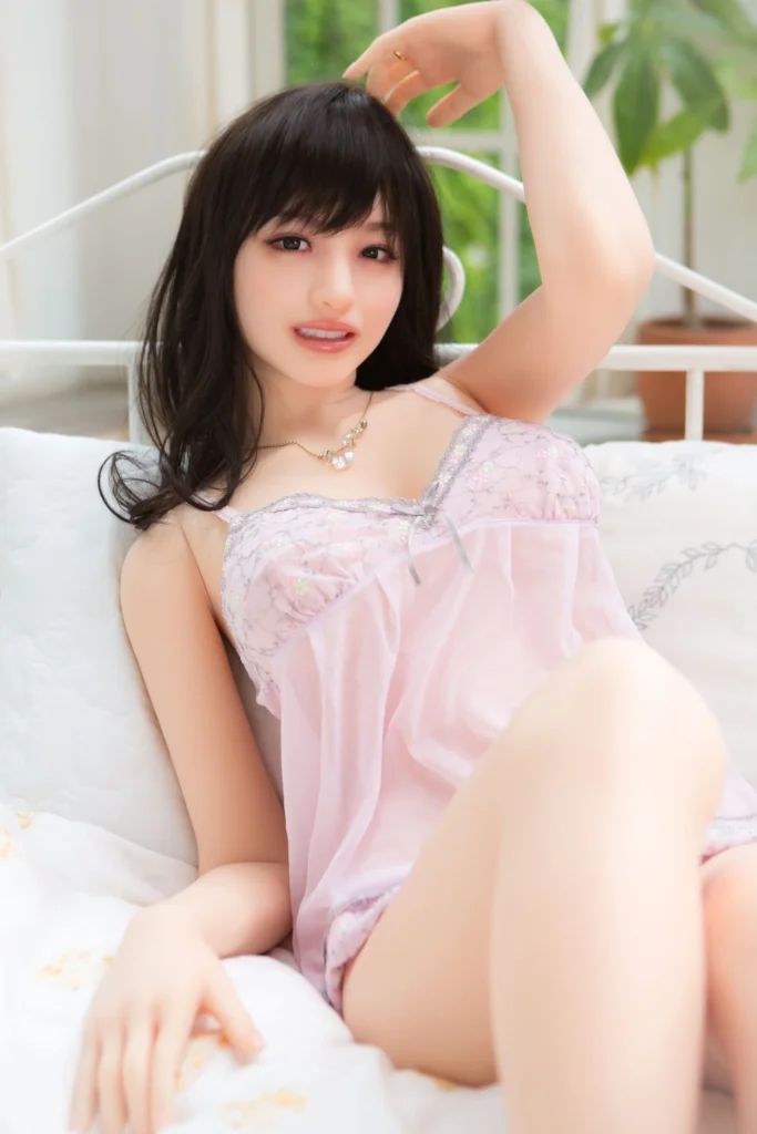 Premium Japanese love doll by Orient Industry in natural indoor setting with realistic skin detail