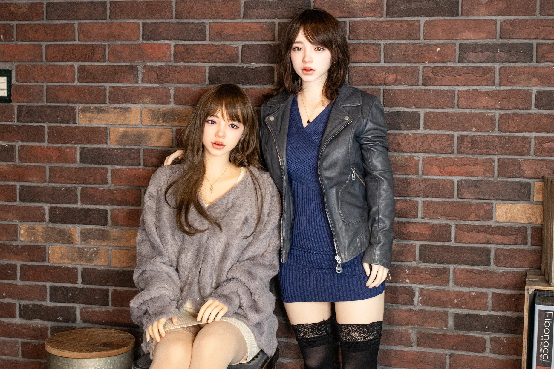 Comparison of two premium Japanese love dolls by Orient Industry showing size and body proportions