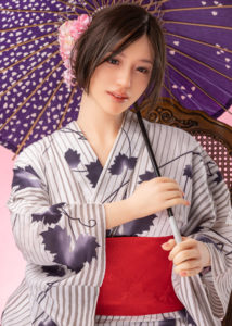 Japanese love doll in yukata under traditional wagasa umbrella