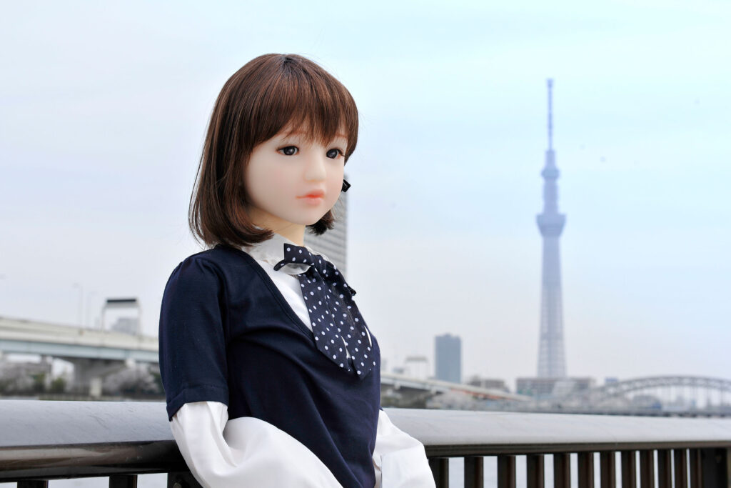 Orient Industry Japanese love doll photographed with Tokyo Skytree in Tokyo