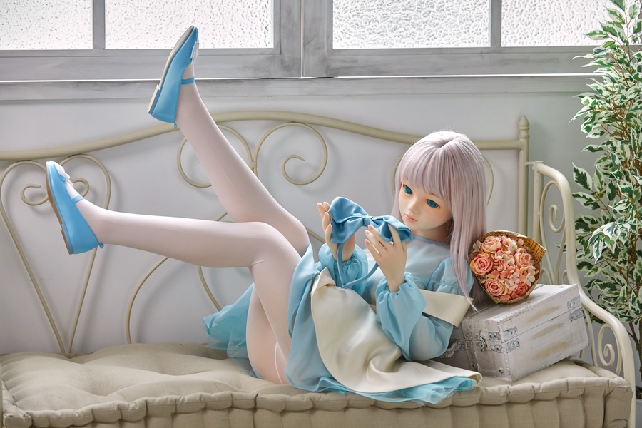 Orient Industry Berry Series Coco relaxing on a sofa